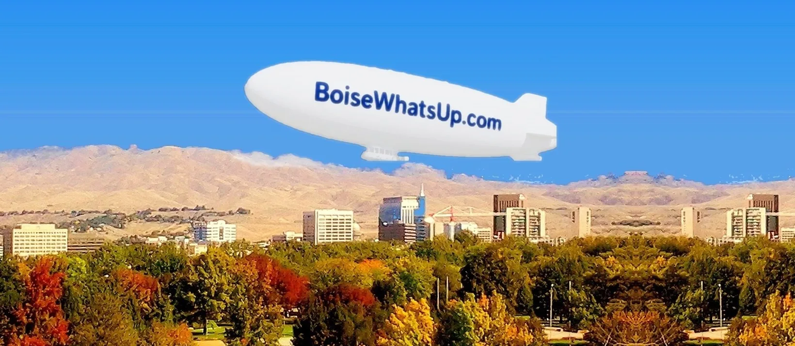 Blimp over downtown Boise, the foothills and fall trees (AI-assisted artwork)